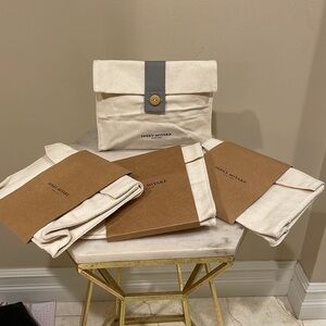 Issay Miyake 4 piece canvas cosmetics pouch